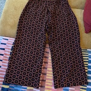 Anthropologie Black and burnt orange Patterned Cropped Pants